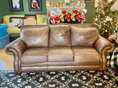 Load image into Gallery viewer, Mega Pack - a gif showing a couch in a family room at Christmas time switching from the before image to the after being treated with Leather Better image.