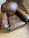 Load image into Gallery viewer, Two image gif that shows a faded and scratched brown leather chair before and after results.