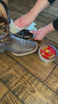 Load and play video in Gallery viewer, A live demo of a cowboy boot being treated with Leather Better and comparing in to the untreated mate.