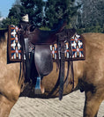 Load image into Gallery viewer, A Leather better treated dark brown western saddle on colourful blanket on top of tan brown horse. Diana's five star review: "Bought it Again. I use it on all my leather shoes, boots, saddle and bridles.  I detailed my truck leather interior and dash with it.  I keep one tin at the barn and one in the garage so I can touch up shoes quickly before leaving the house!"