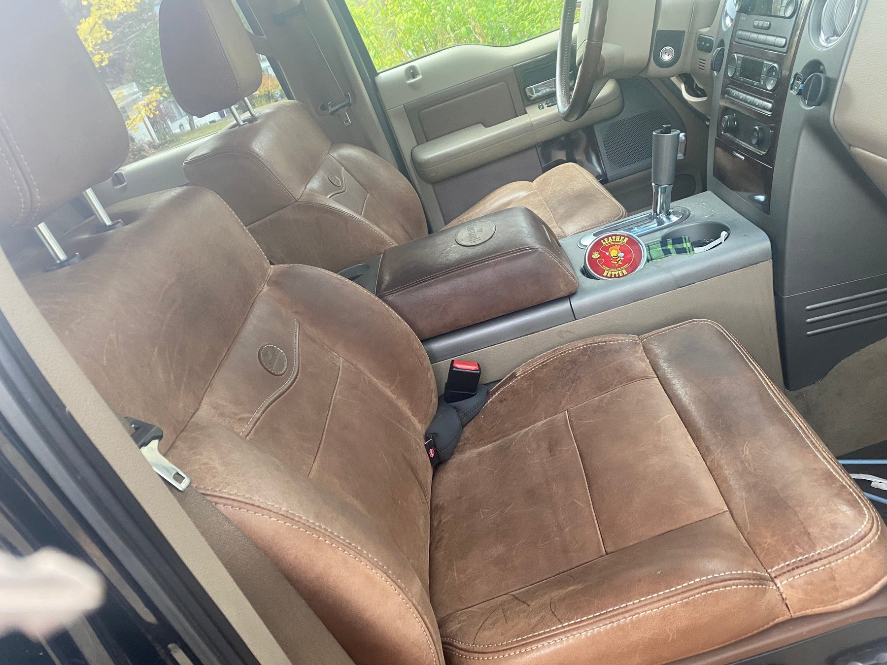 King Ranch car seats prior to being treated with Leather Better.