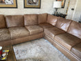 Load image into Gallery viewer, A large leather sectional. Customer, Kristy's five star review: "I thought I was going to have to have to have my leather sectional recovered. This was my last hope. It was an amazing transformation! I used my husband’s electric car buffer to apply (sponge pad) and went back over it with the microfiber pad. Almost every dog scratch is gone! Side advantages…It smells good and my own cuticles are really soft:) Pic is before on left and after on right."