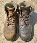 Load image into Gallery viewer, A pair of worn and faded leather hiking boots, the boot on the left is untreated. The right boot is treated with Leather better.