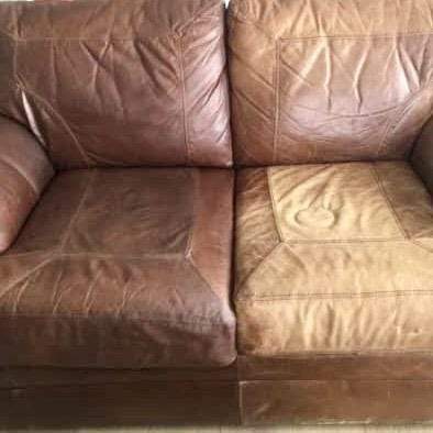 A brown leather love seat that has been half treated with Leather Better.  The left side is faded and worn looking a pale brown almost yellow in colour.  The right side is moisturized and back to the original brown colours