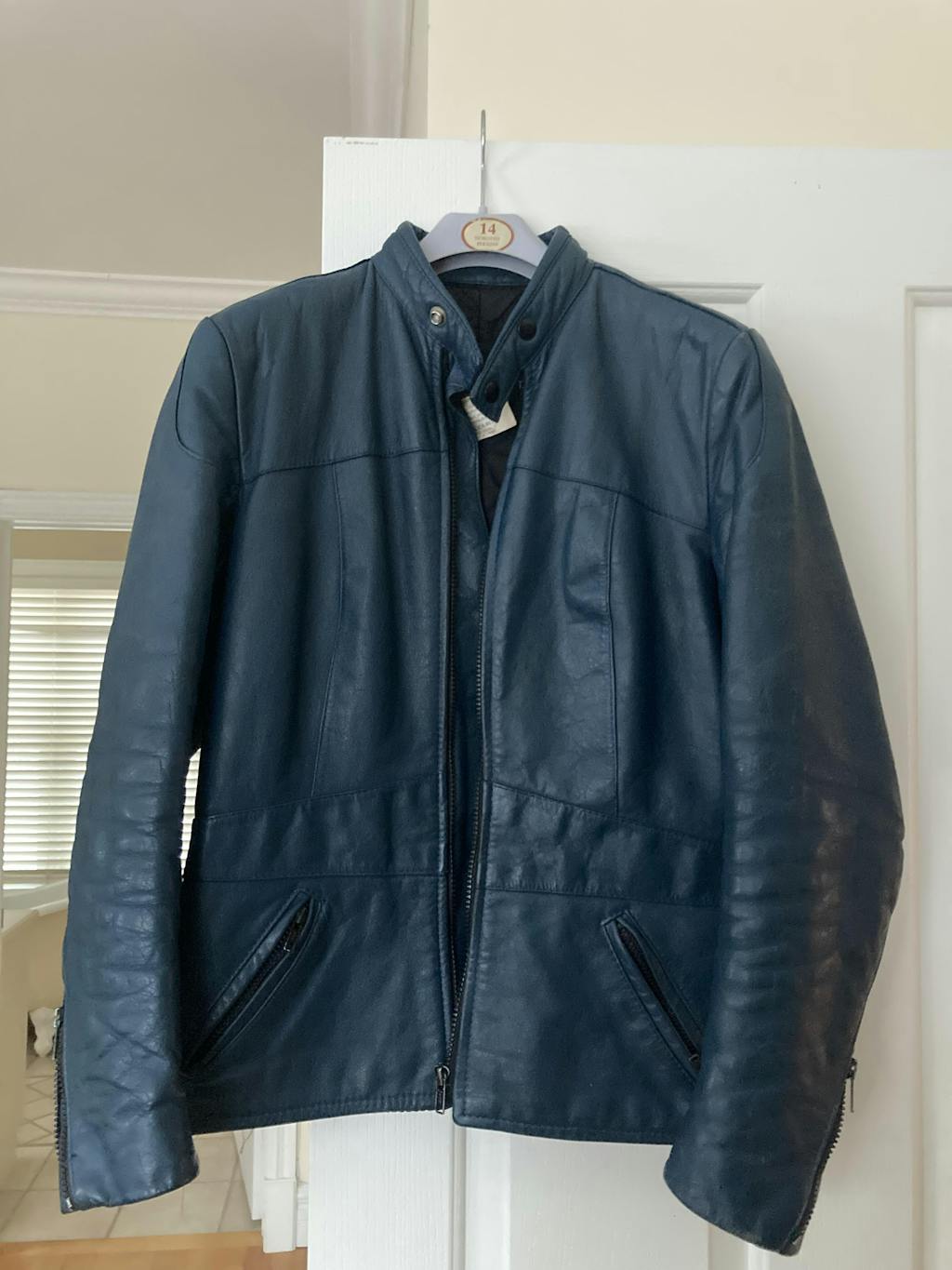 A restored rich blue motorcycle jacket after being treated. Louise's five star review: "Just wow! I couldn’t wait to receive my tin of Leather Better to revive my over 30 year old motorcycle jacket. It was cracked & faded and looking very old. The tin arrived today and I got to work immediately! I could not be more thrilled with the results. It looks like new. Just… wow! My jacket actually returned to the original rich blue colour. 
Thanks so much for an incredible product. The bonus it smells good too!"